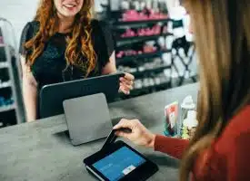 woman holding magnetic card
